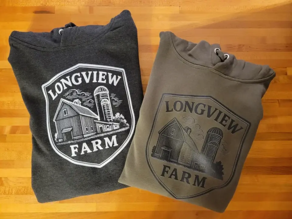 Two hoodies printed with Longview Farm artwork